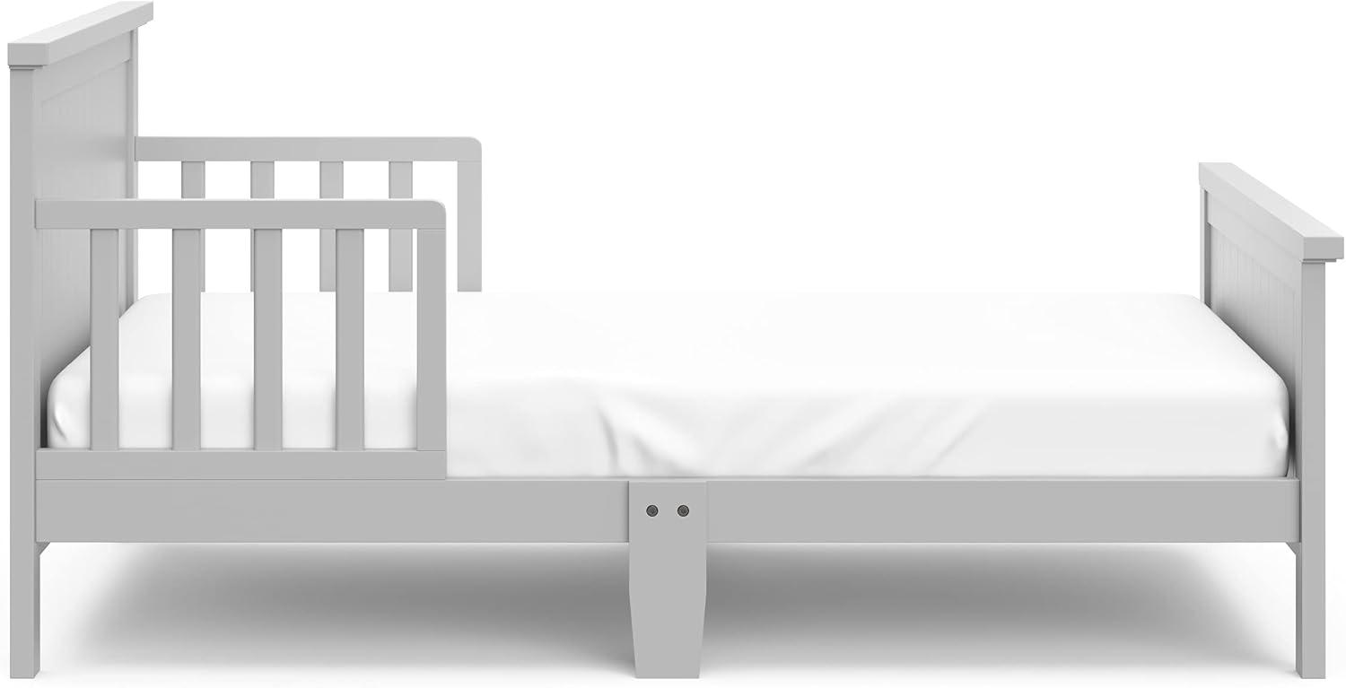 imageGraco Bailey Toddler Bed Pebble Gray GREENGUARD Gold Certified Fits Standard FullSize Crib ampamp Toddler Mattress Toddler Safety Guardrails Included Complete Design with Solid Headboard FootboardPebble Gray