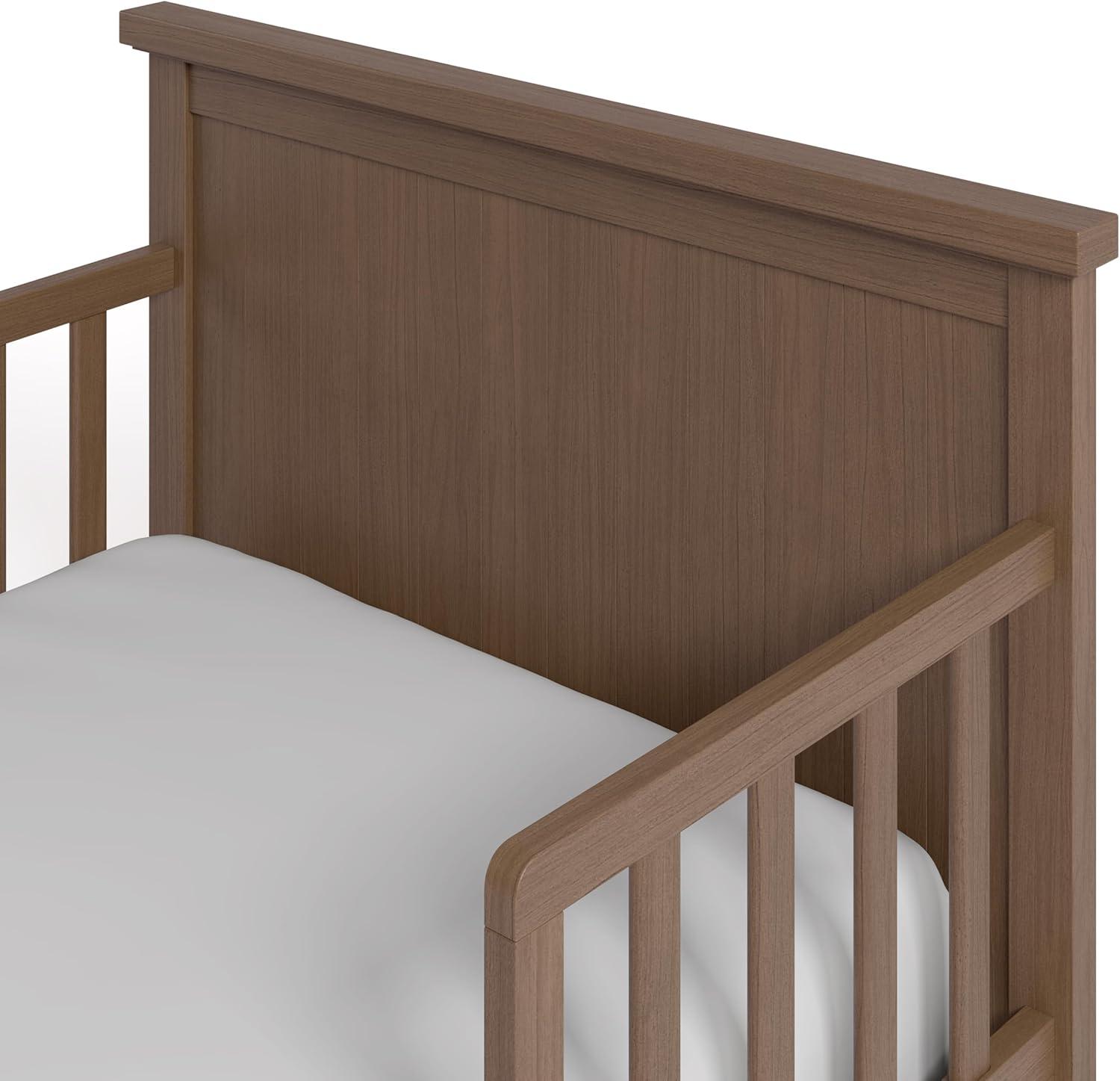 imageGraco Bailey Toddler Bed Pebble Gray GREENGUARD Gold Certified Fits Standard FullSize Crib ampamp Toddler Mattress Toddler Safety Guardrails Included Complete Design with Solid Headboard FootboardHazelnut