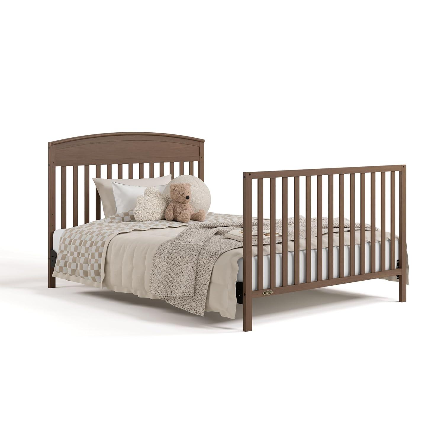 imageGraco Benton 5in1 Convertible Crib Pebble Gray GREENGUARD Gold Certified Converts from Baby Crib to Toddler Bed Daybed and FullSize Bed Fits Standard FullSize Crib MattressHazelnut