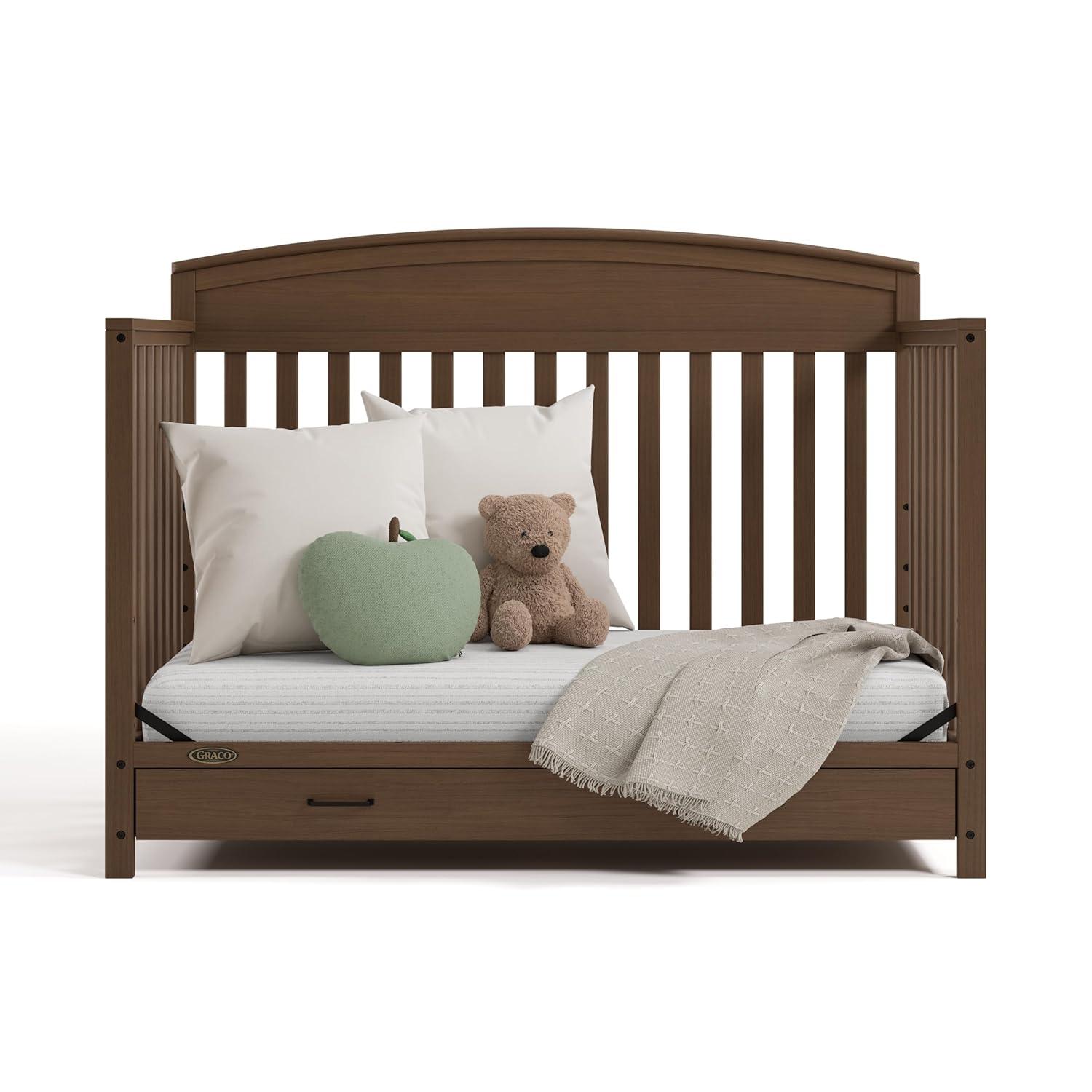 imageGraco Benton 5in1 Convertible Crib Pebble Gray GREENGUARD Gold Certified Converts from Baby Crib to Toddler Bed Daybed and FullSize Bed Fits Standard FullSize Crib MattressHazelnut