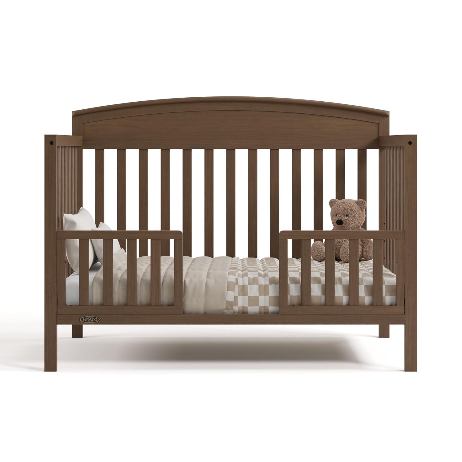 imageGraco Benton 5in1 Convertible Crib Pebble Gray GREENGUARD Gold Certified Converts from Baby Crib to Toddler Bed Daybed and FullSize Bed Fits Standard FullSize Crib MattressHazelnut