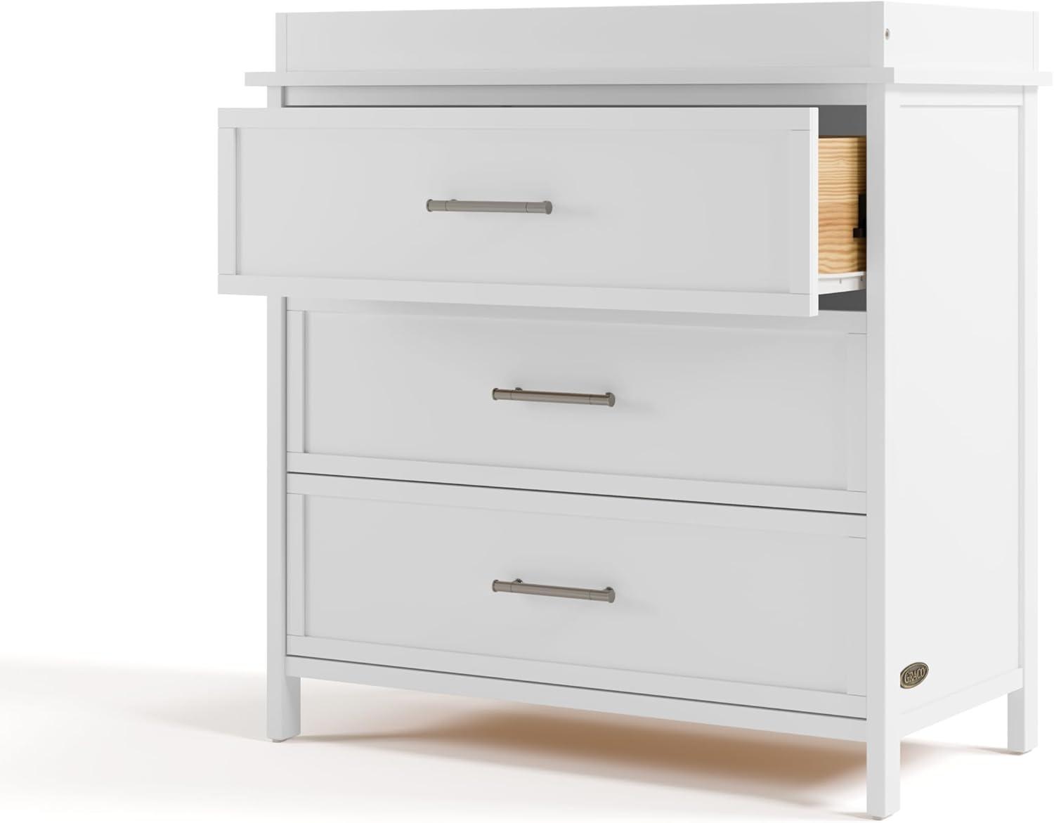 imageGraco Classic 3 Drawer Changing Table Dresser White GREENGUARD Gold Certified Baby Dresser with Changing Table Top Includes Interlocking Drawer SystemWhite