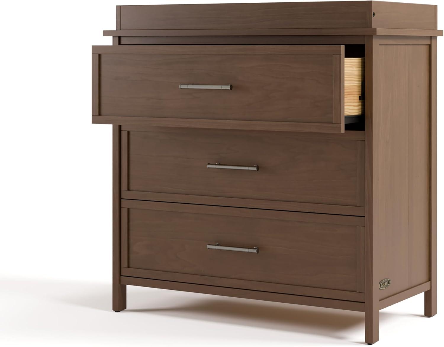 imageGraco Classic 3 Drawer Changing Table Dresser White GREENGUARD Gold Certified Baby Dresser with Changing Table Top Includes Interlocking Drawer SystemHazelnut