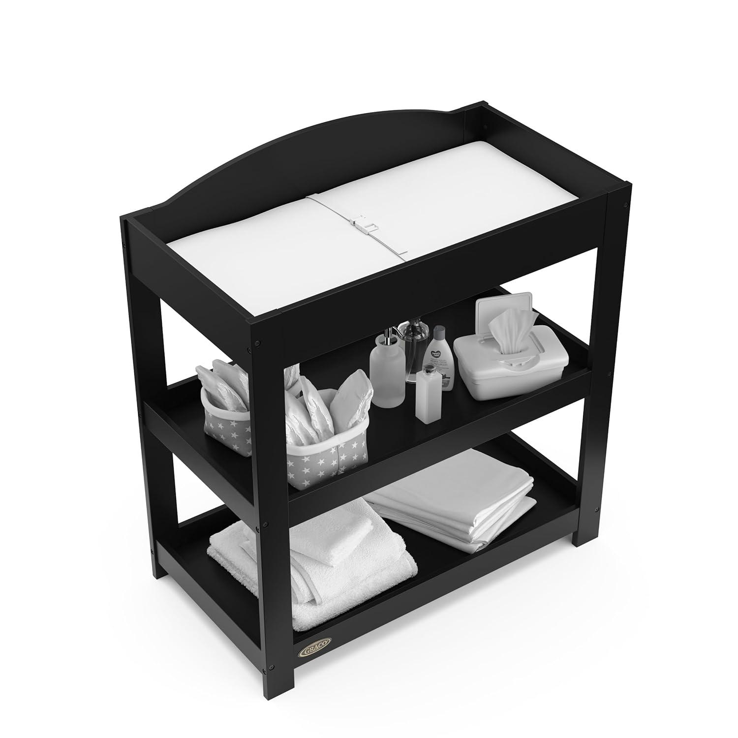 imageGraco Customizable Changing Table with WaterResistant Changing Pad White Customizable Modern Flat or Classic Arched Headboard Baby Diaper Changing Pad IncludedBlack