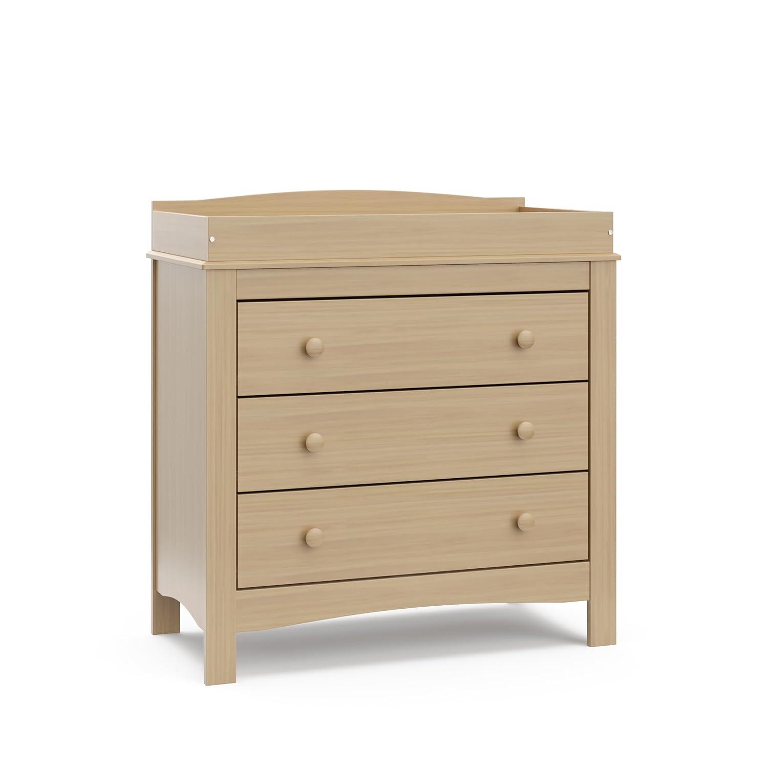 imageGraco Noah 3 Drawer Chest with Changing Topper Pebble Gray GREENGUARD Gold Certified Baby Dresser Table Top for Nursery KidsDriftwood