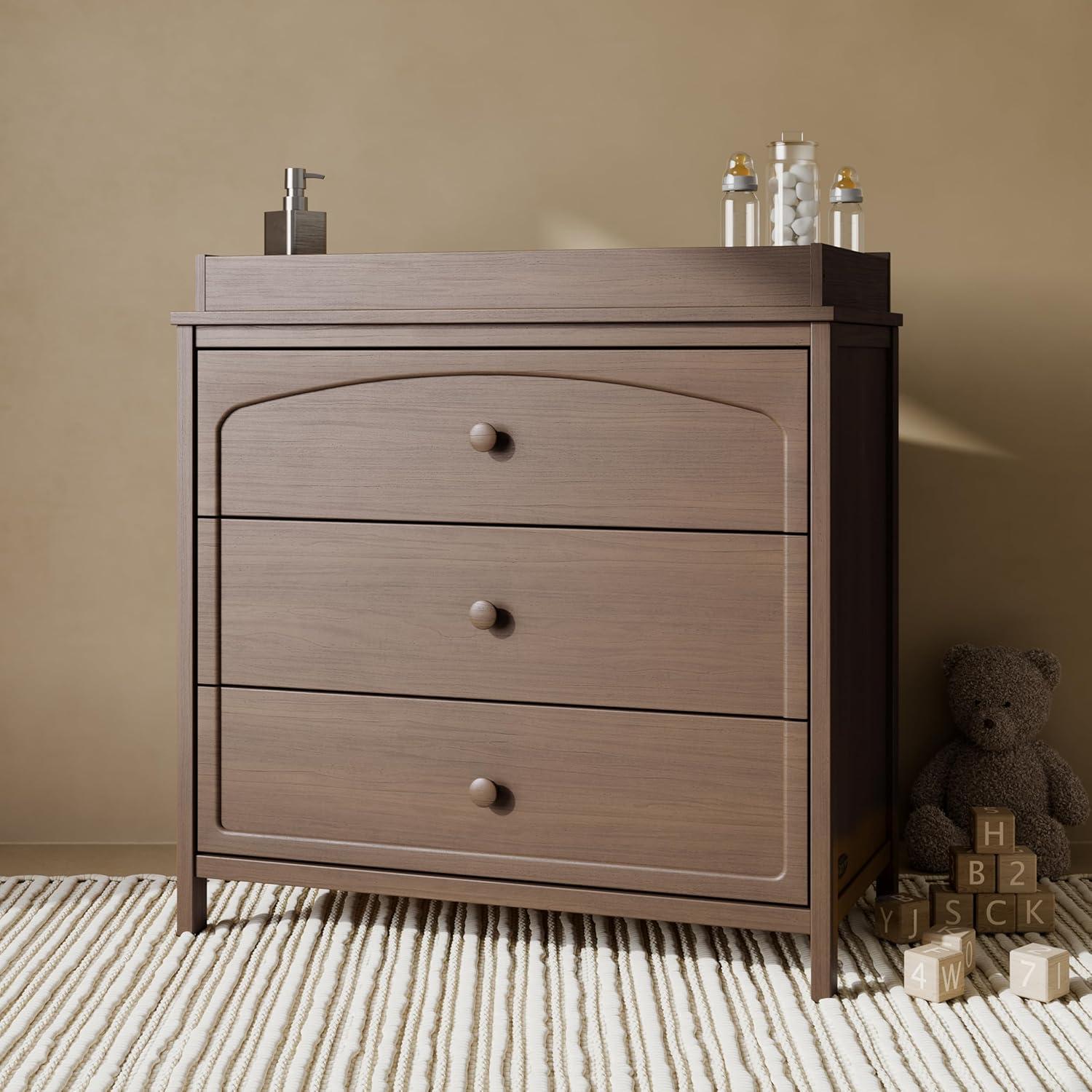 imageGraco Olivia 6 Drawer Double Dresser Driftwood GREENGUARD Gold Certified Storage for Baby and Kids Bedroom Interlocking Drawer System AntiTip Kit IncludedHazelnut