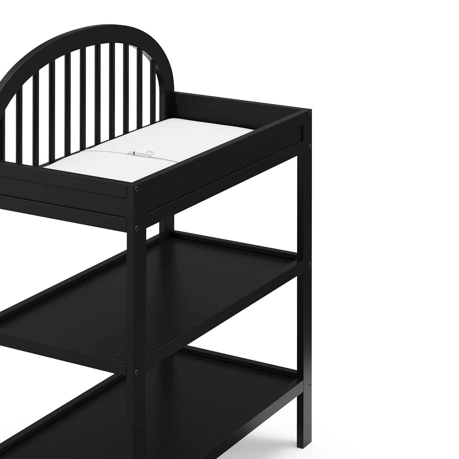 imageGraco Olivia Changing Table with WaterResistant Changing Pad Driftwood GREENGUARD Gold Certified Includes Bonus WaterResistant Changing Pad with Safety Strap 2 Open Shelves Stylish DesignBlack