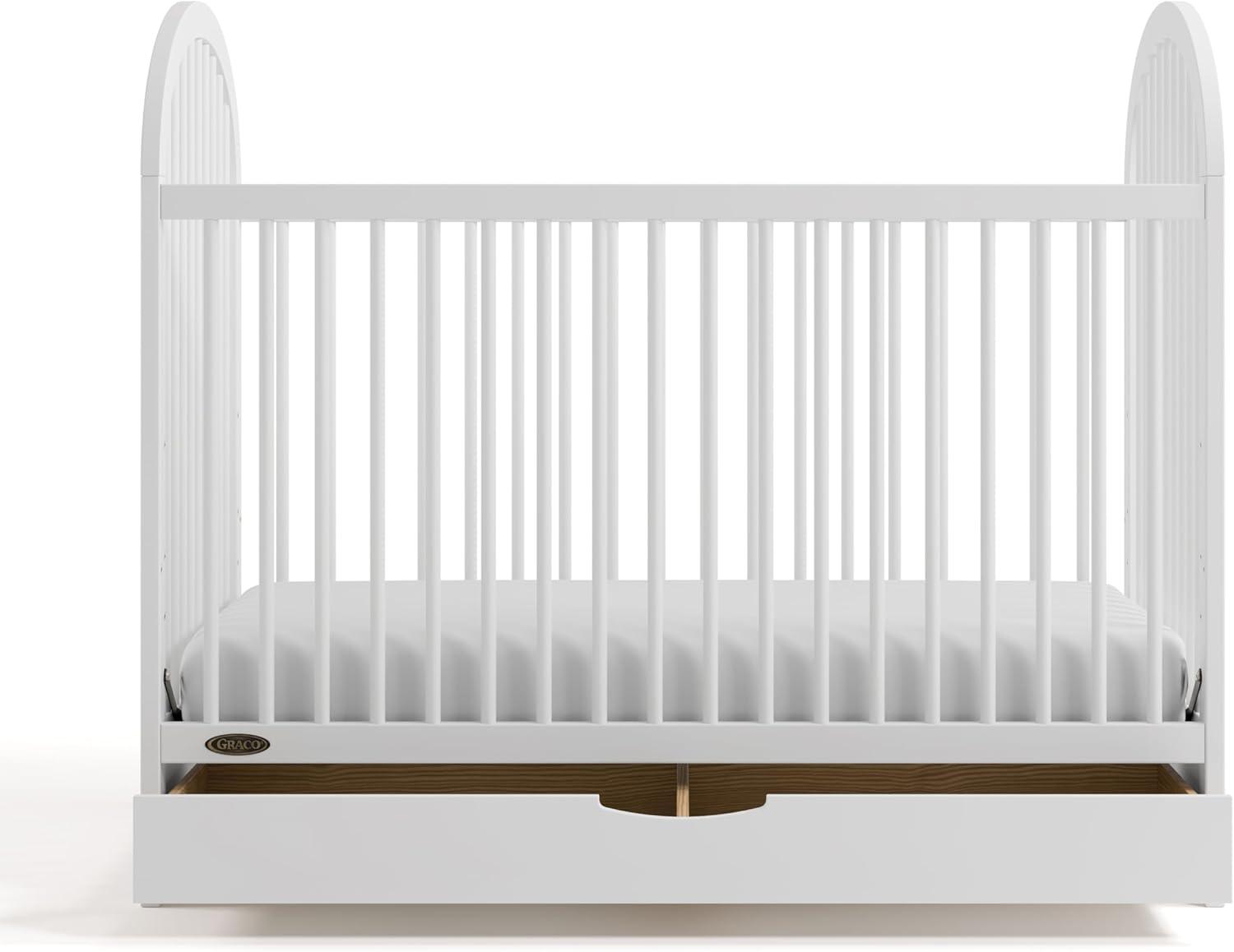 imageGraco Olivia Convertible Crib Black GREENGUARD Gold Certified 100 Solid Wood Fits Standard Crib Mattress Converts to Toddler Bed and Daybed 4 Adjustable Mattress HeightsWhite