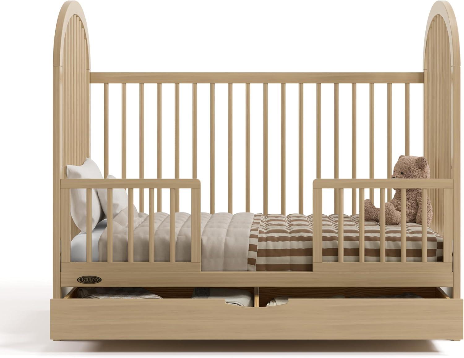 imageGraco Olivia Convertible Crib Black GREENGUARD Gold Certified 100 Solid Wood Fits Standard Crib Mattress Converts to Toddler Bed and Daybed 4 Adjustable Mattress HeightsDriftwood