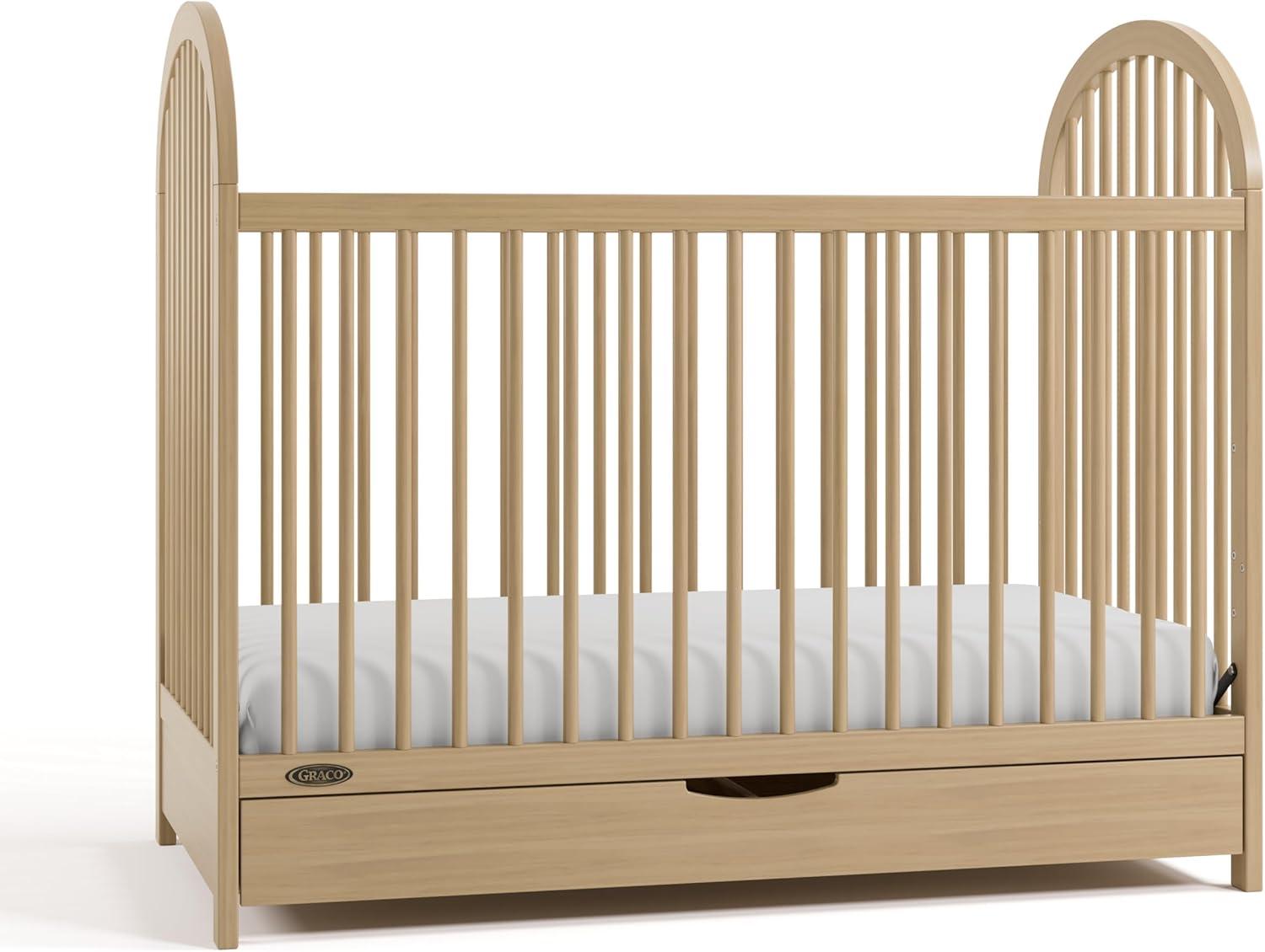 imageGraco Olivia Convertible Crib Black GREENGUARD Gold Certified 100 Solid Wood Fits Standard Crib Mattress Converts to Toddler Bed and Daybed 4 Adjustable Mattress HeightsDriftwood