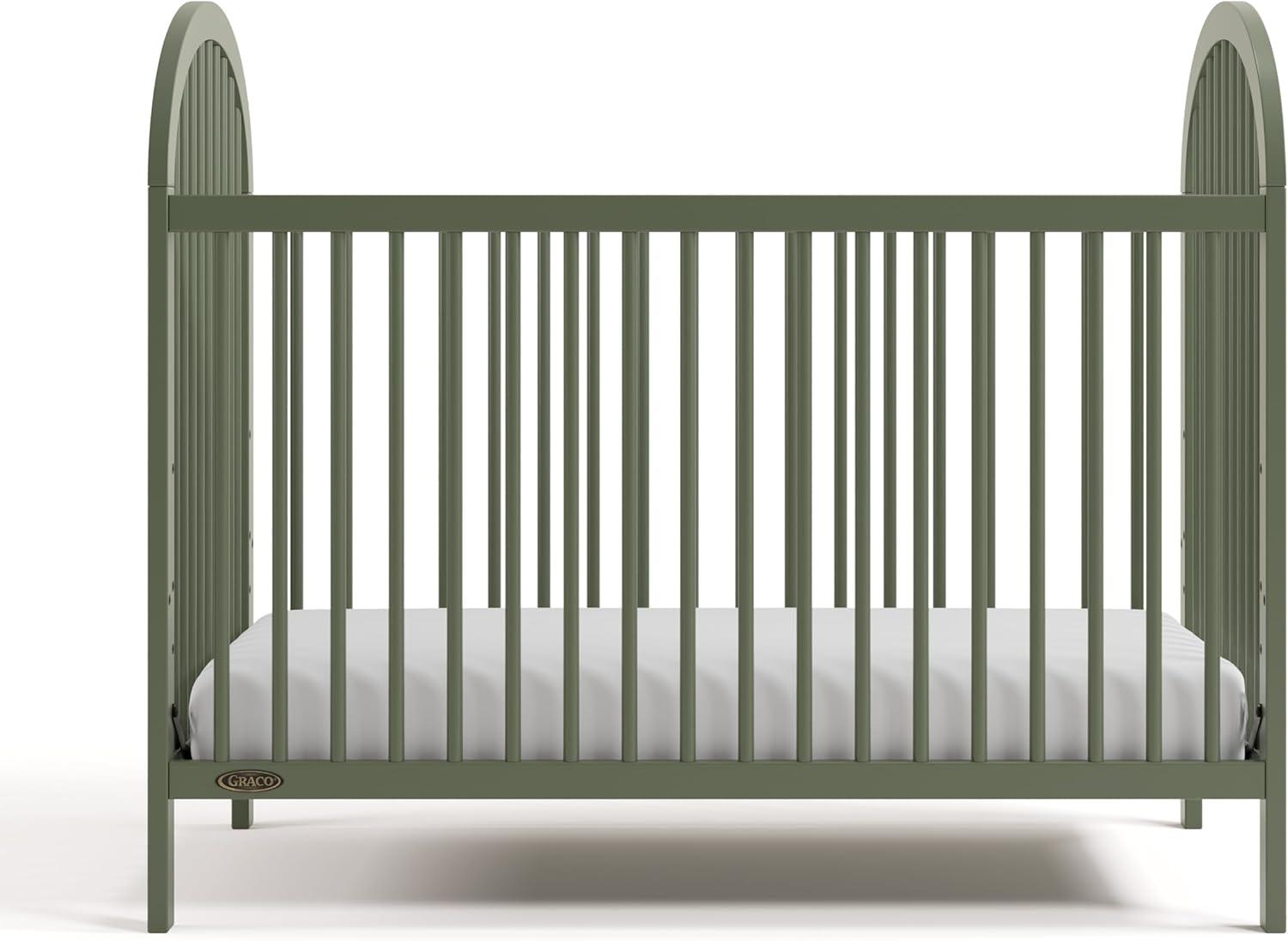 imageGraco Olivia Convertible Crib Black GREENGUARD Gold Certified 100 Solid Wood Fits Standard Crib Mattress Converts to Toddler Bed and Daybed 4 Adjustable Mattress HeightsOlive