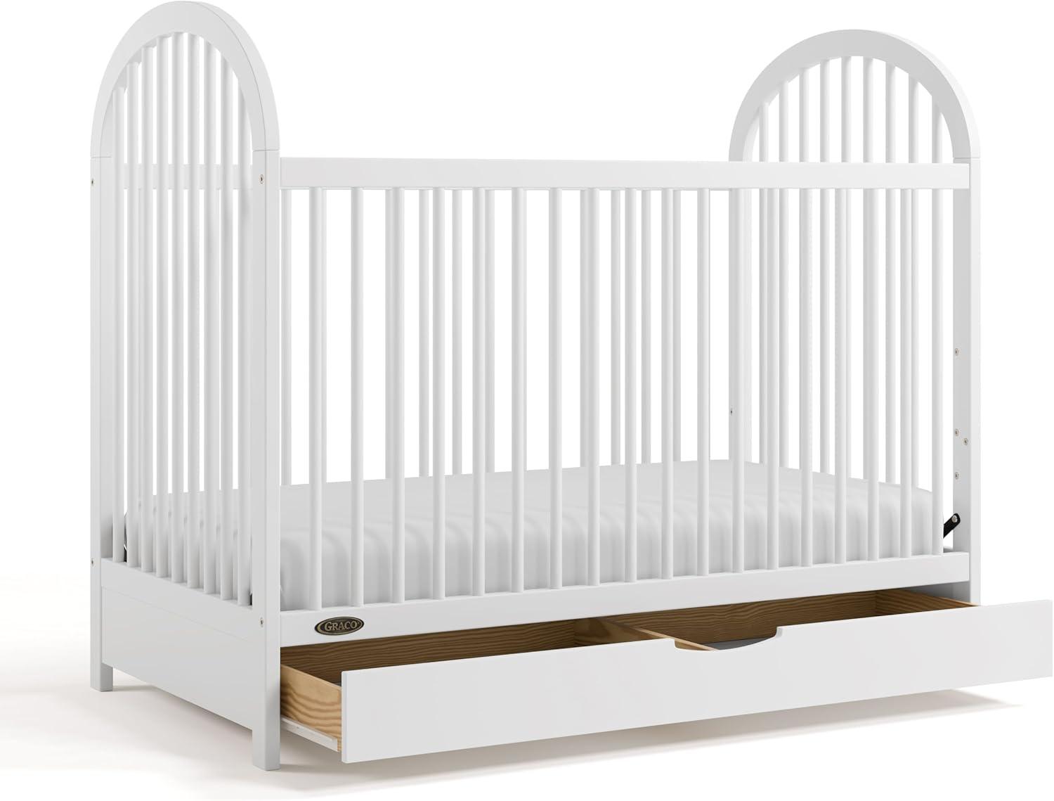 imageGraco Olivia Convertible Crib Black GREENGUARD Gold Certified 100 Solid Wood Fits Standard Crib Mattress Converts to Toddler Bed and Daybed 4 Adjustable Mattress HeightsWhite