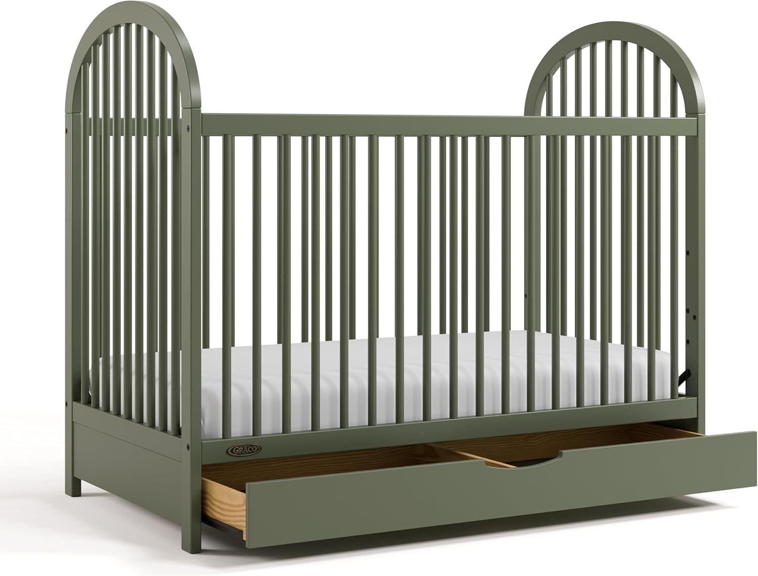 imageGraco Olivia Convertible Crib Black GREENGUARD Gold Certified 100 Solid Wood Fits Standard Crib Mattress Converts to Toddler Bed and Daybed 4 Adjustable Mattress HeightsOlive