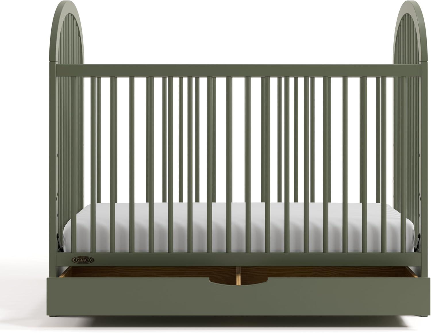 imageGraco Olivia Convertible Crib Black GREENGUARD Gold Certified 100 Solid Wood Fits Standard Crib Mattress Converts to Toddler Bed and Daybed 4 Adjustable Mattress HeightsOlive