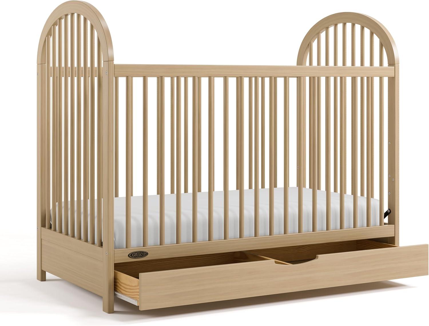 imageGraco Olivia Convertible Crib Black GREENGUARD Gold Certified 100 Solid Wood Fits Standard Crib Mattress Converts to Toddler Bed and Daybed 4 Adjustable Mattress HeightsDriftwood