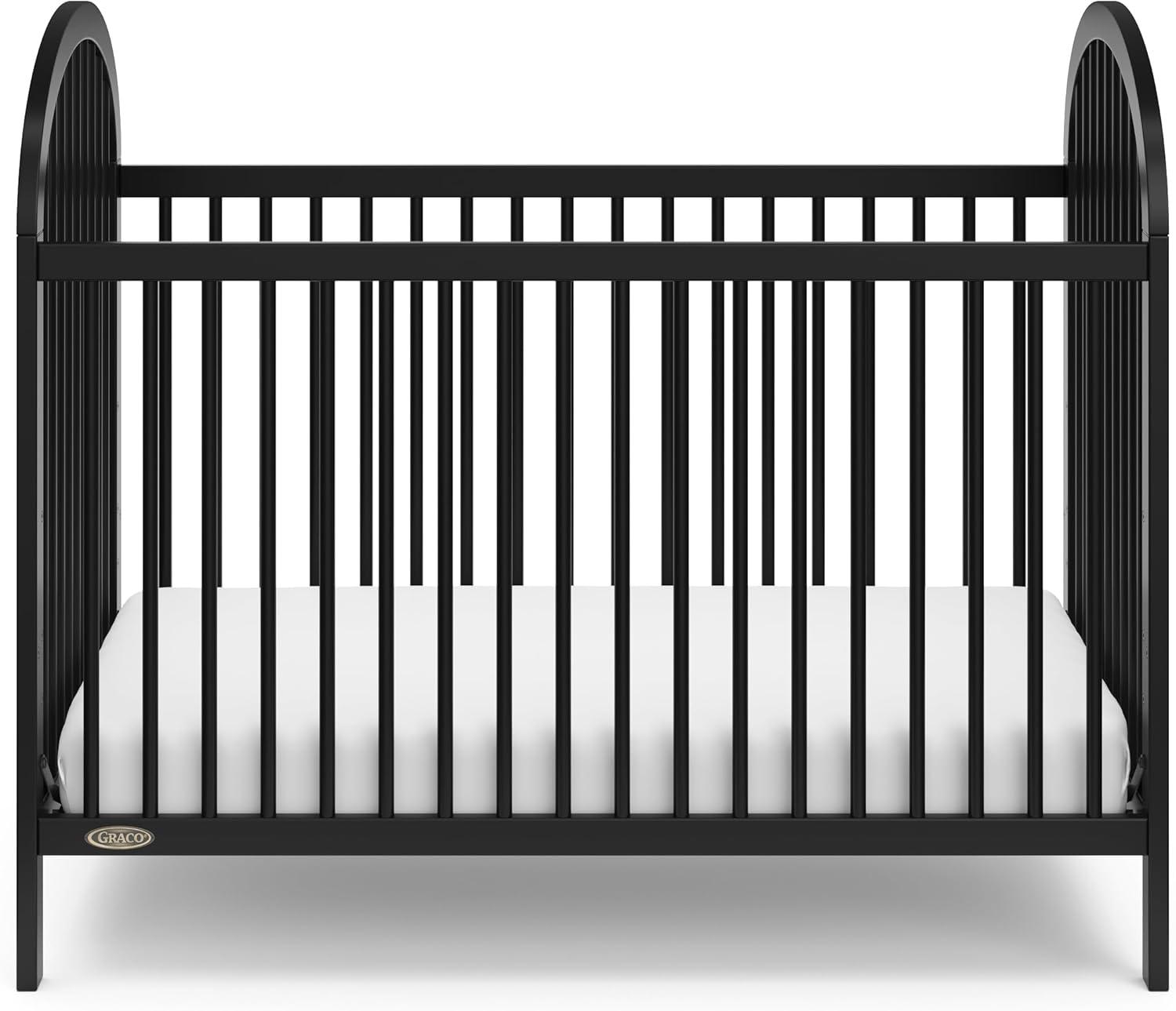 imageGraco Olivia Convertible Crib Black GREENGUARD Gold Certified 100 Solid Wood Fits Standard Crib Mattress Converts to Toddler Bed and Daybed 4 Adjustable Mattress HeightsBlack