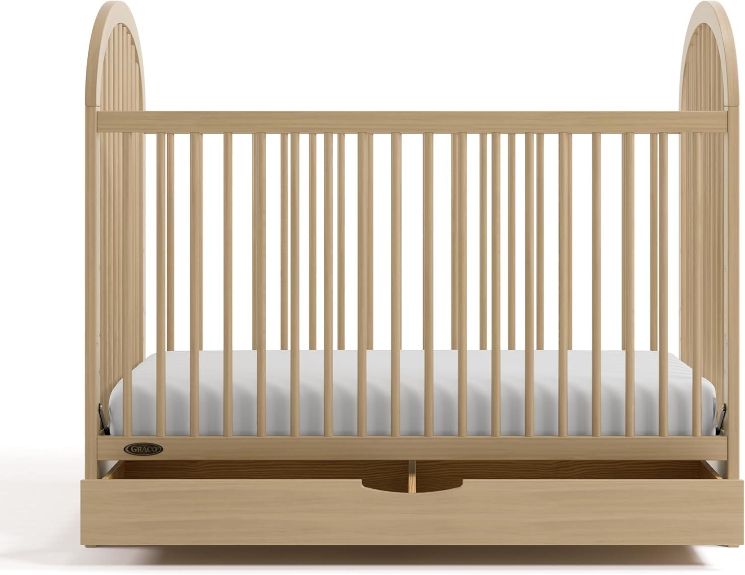 imageGraco Olivia Convertible Crib Hazelnut GREENGUARD Gold Certified 100 Solid Wood Fits Standard Crib Mattress Converts to Toddler Bed and Daybed 4 Adjustable Mattress HeightsDriftwood