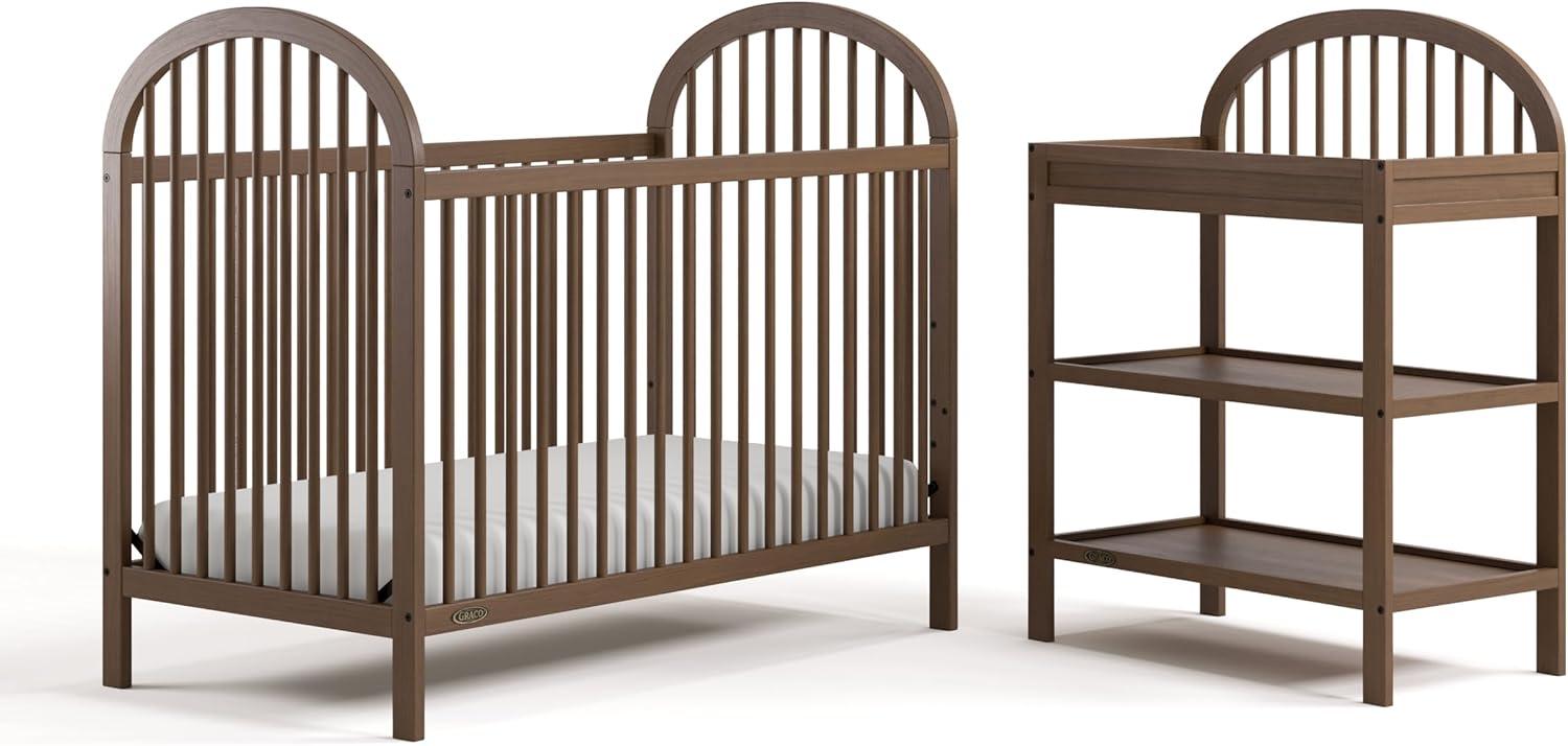 imageGraco Olivia Convertible Crib Hazelnut GREENGUARD Gold Certified 100 Solid Wood Fits Standard Crib Mattress Converts to Toddler Bed and Daybed 4 Adjustable Mattress HeightsHazelnut