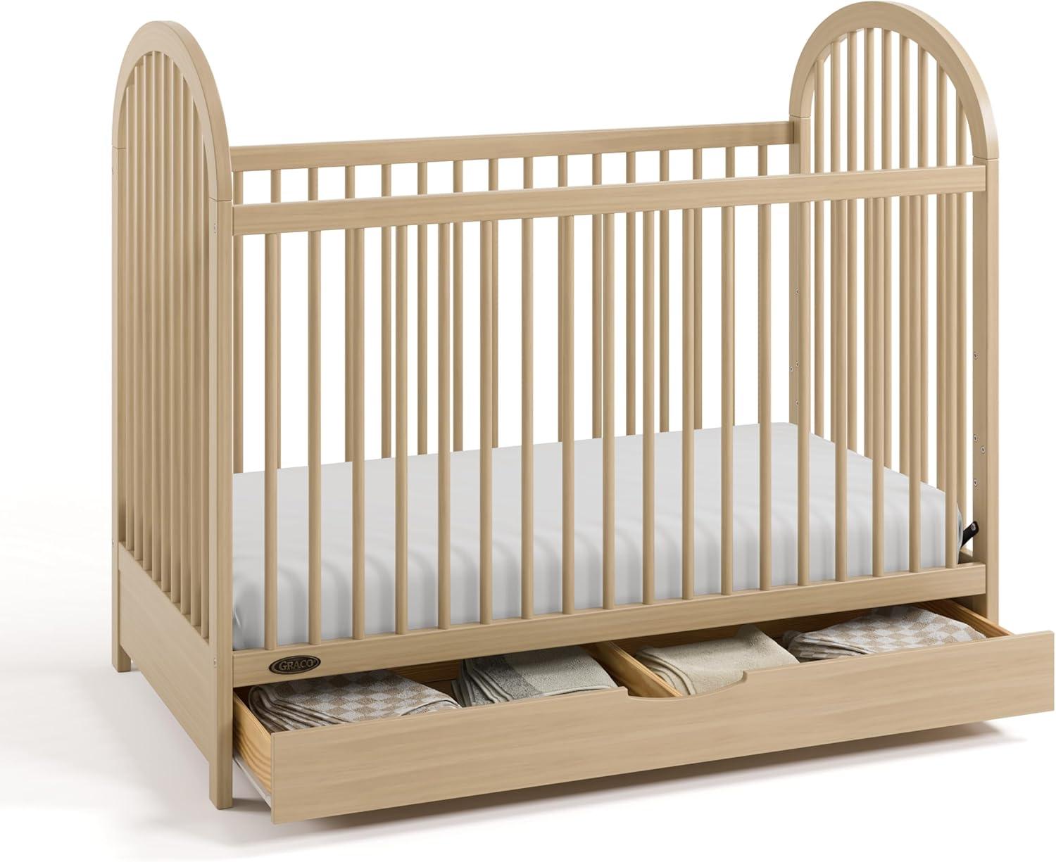 imageGraco Olivia Convertible Crib Hazelnut GREENGUARD Gold Certified 100 Solid Wood Fits Standard Crib Mattress Converts to Toddler Bed and Daybed 4 Adjustable Mattress HeightsDriftwood