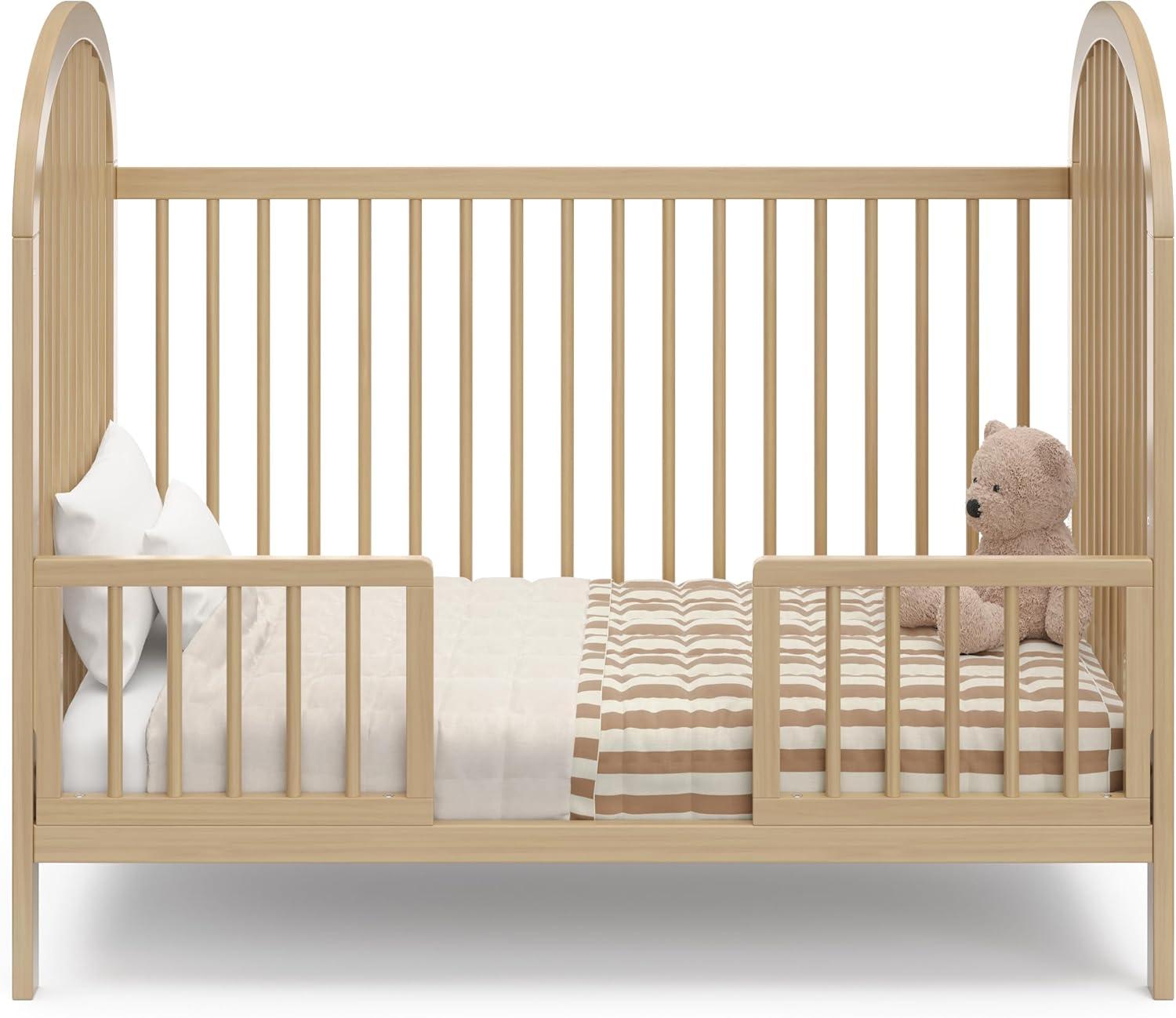 imageGraco Olivia Convertible Crib Hazelnut GREENGUARD Gold Certified 100 Solid Wood Fits Standard Crib Mattress Converts to Toddler Bed and Daybed 4 Adjustable Mattress HeightsDriftwood