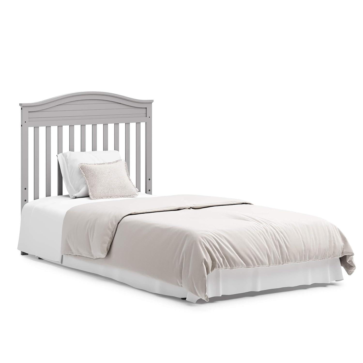 imageGraco Stella 4in1 Convertible Mini Crib with Bonus Mattress Pebble Gray Includes Bonus 275 Inch Thick Mattress with WaterResistant Cover Converts to Twin Bed Ideal Crib for Small SpacesPebble Gray