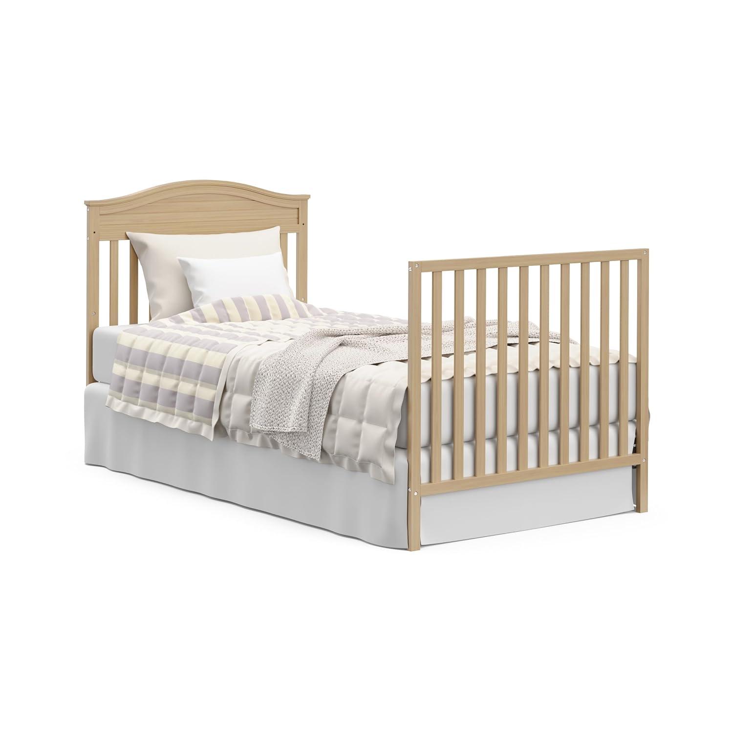 imageGraco Stella 4in1 Convertible Mini Crib with Bonus Mattress Pebble Gray Includes Bonus 275 Inch Thick Mattress with WaterResistant Cover Converts to Twin Bed Ideal Crib for Small SpacesDriftwood
