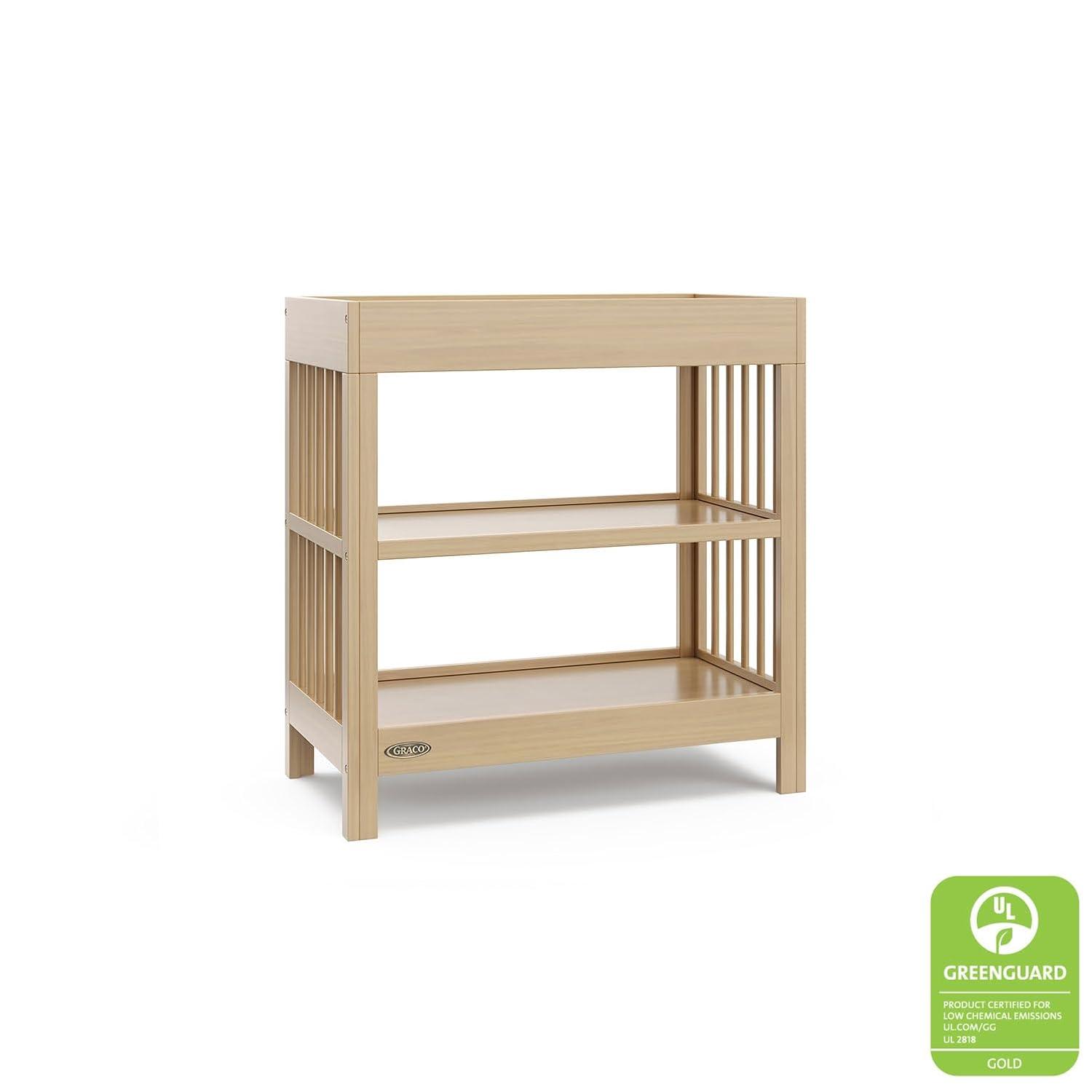 imageGraco Teddi Changing Table with WaterResistant Changing Pad Driftwood GREENGUARD Gold Certified Includes Bonus WaterResistant Changing Pad with Safety Strap 2 Shelves EasytoMatchDriftwood