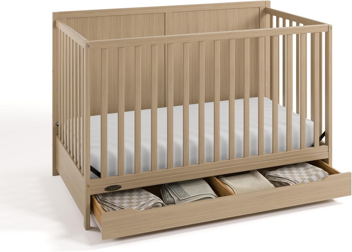 imageGraco Melrose 5in1 Convertible Crib with Drawer White GREENGUARD Gold Certified Fits Standard Crib Mattress Converts to Toddler Bed Daybed and Full Bed 4 Adjustable Mattress HeightsDriftwood