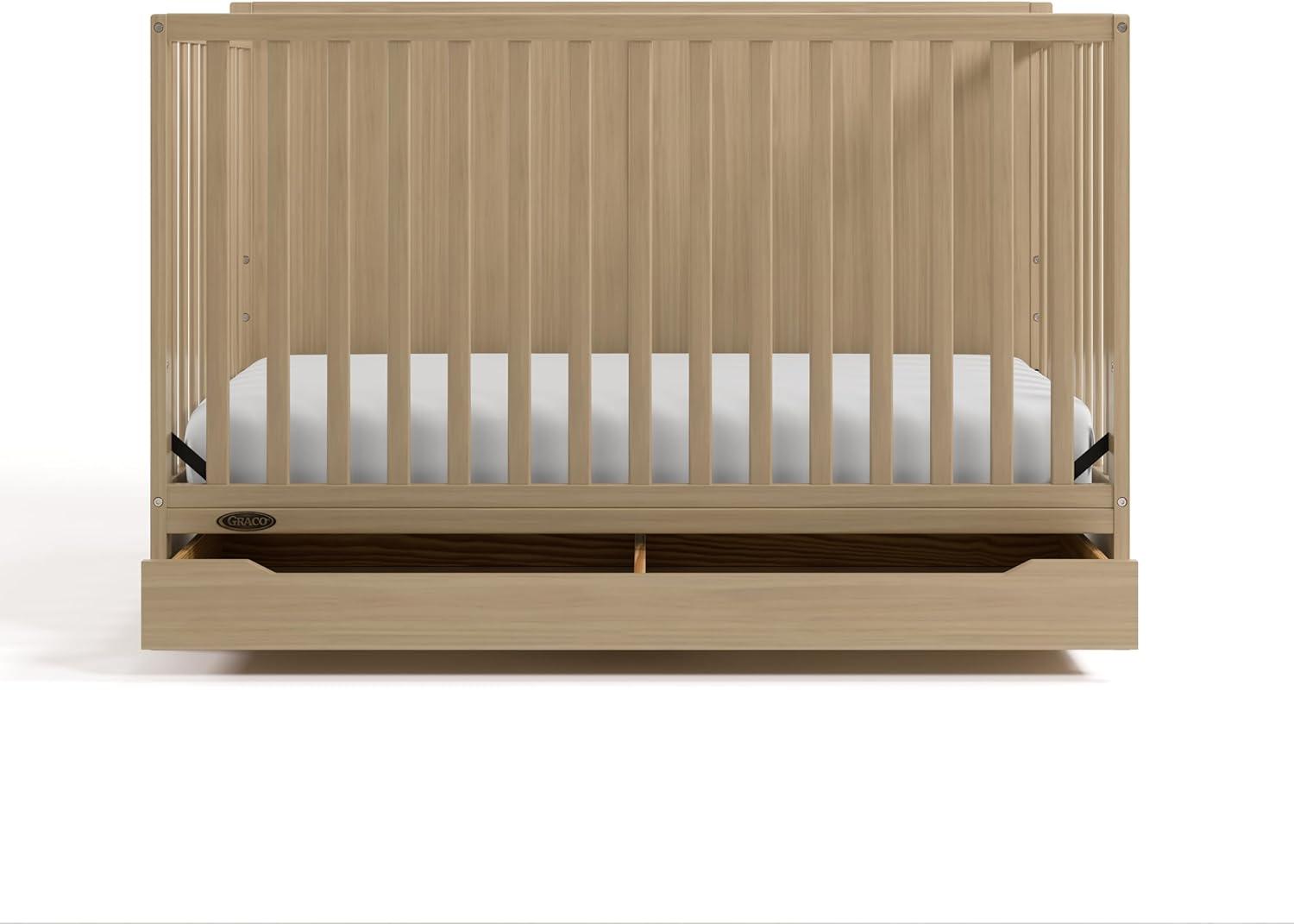 imageGraco Melrose 5in1 Convertible Crib with Drawer White GREENGUARD Gold Certified Fits Standard Crib Mattress Converts to Toddler Bed Daybed and Full Bed 4 Adjustable Mattress HeightsDriftwood