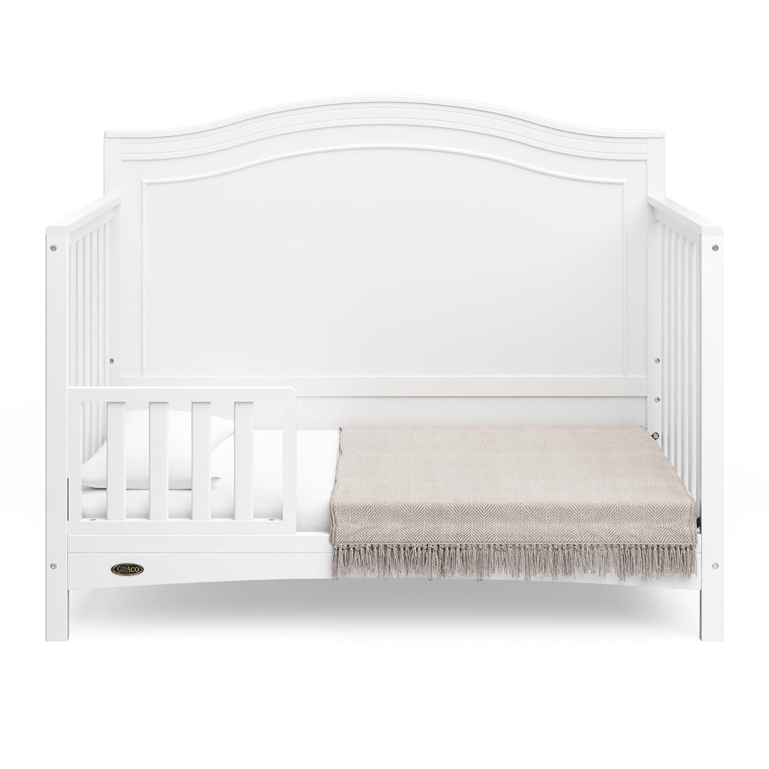 imageGraco Paris 4in1 Convertible Crib GREENGUARD Gold Certified Converts to Toddler Bed Daybed and Full Bed Fits Standard Crib Mattress Adjustable Mattress Base Frosted OatWhite