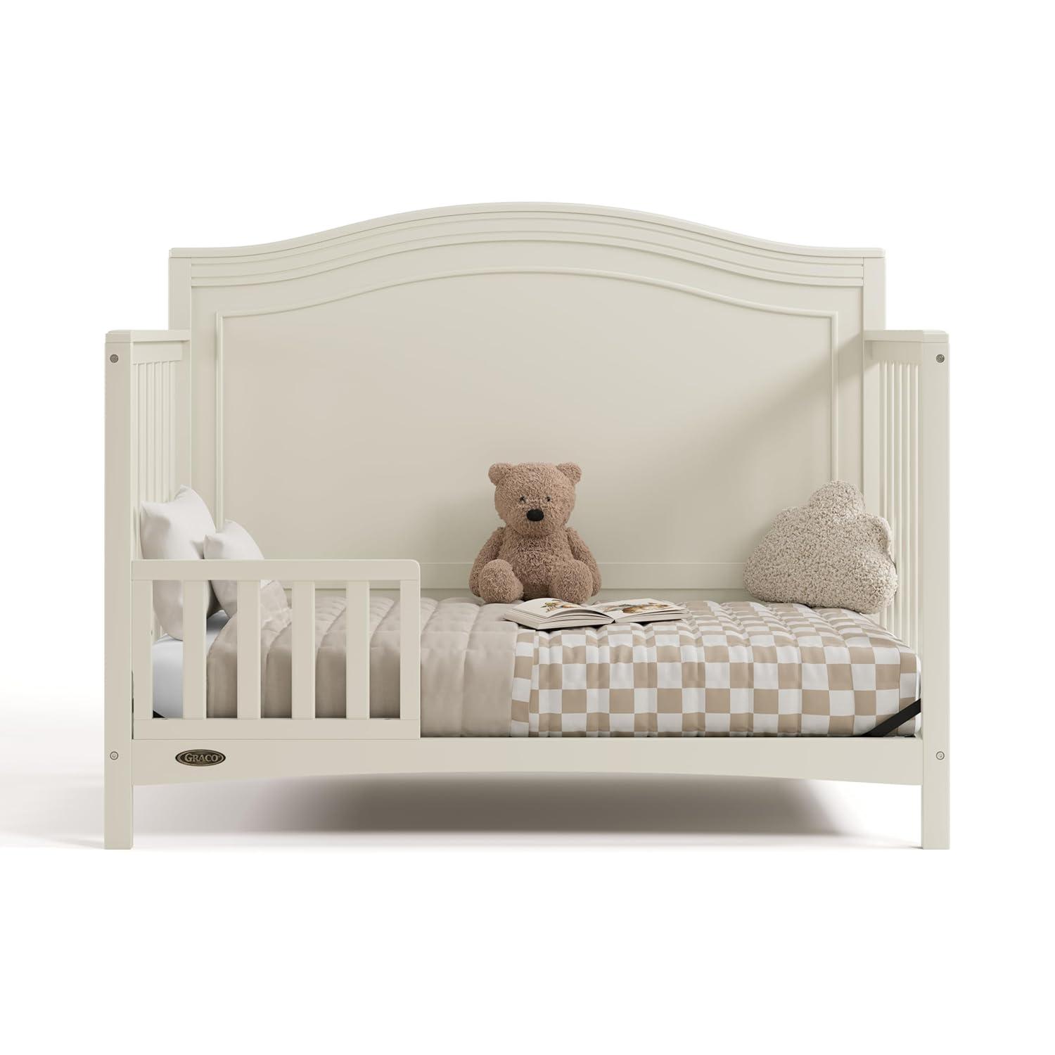imageGraco Paris 4in1 Convertible Crib GREENGUARD Gold Certified Converts to Toddler Bed Daybed and Full Bed Fits Standard Crib Mattress Adjustable Mattress Base Frosted OatFrosted Oat