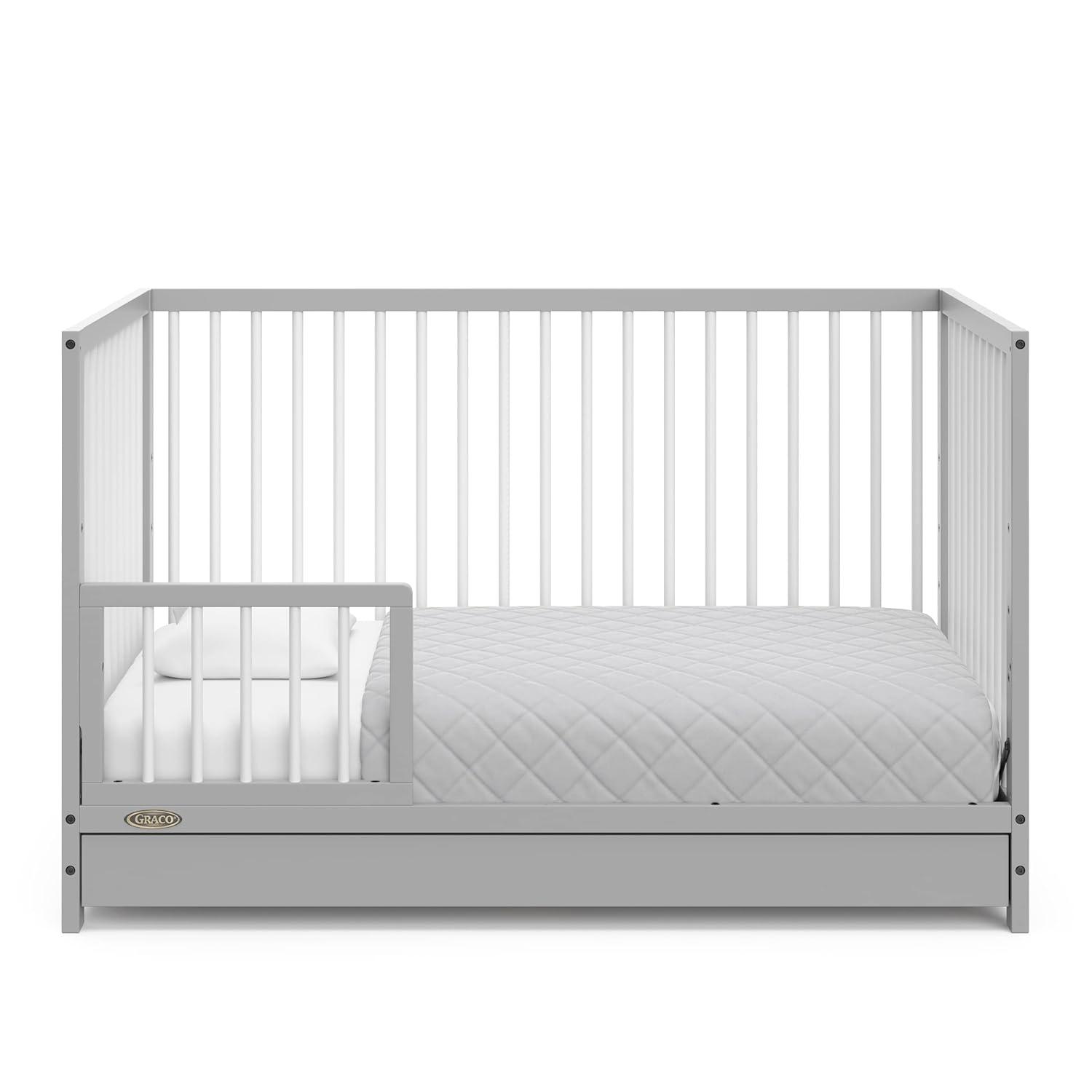 imageGraco Teddi 5in1 Convertible Crib with Drawer Driftwood GREENGUARD Gold Certified Crib with Drawer Combo FullSize Nursery Storage Drawer Converts to Toddler Bed Daybed and FullSize BedPebble GrayWhite