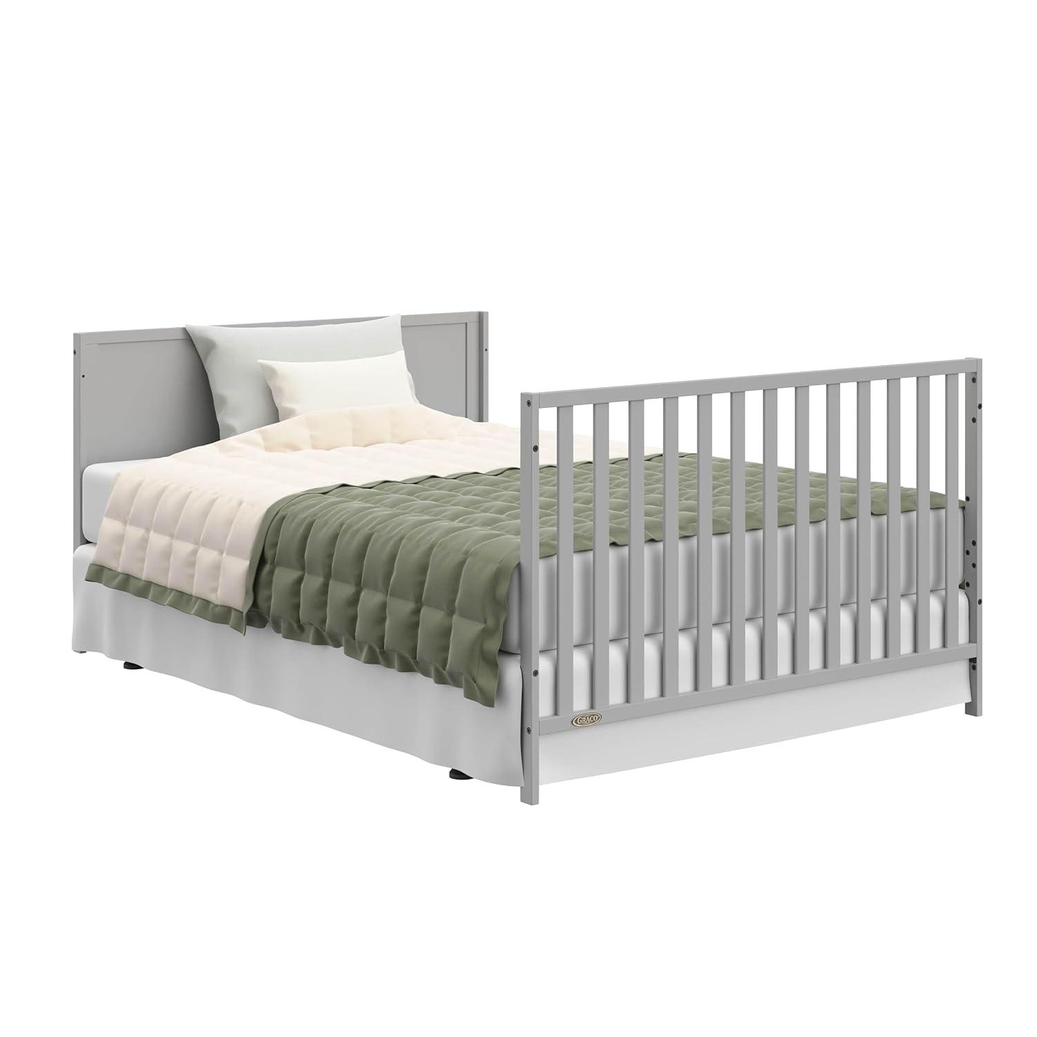 imageGraco Theo Convertible Crib with Storage Drawer Frosted Oat GREENGUARD Gold Certified Wooden Baby Crib with Drawer Converts to Toddler Bed Fits Standard Crib MattressPebble Gray