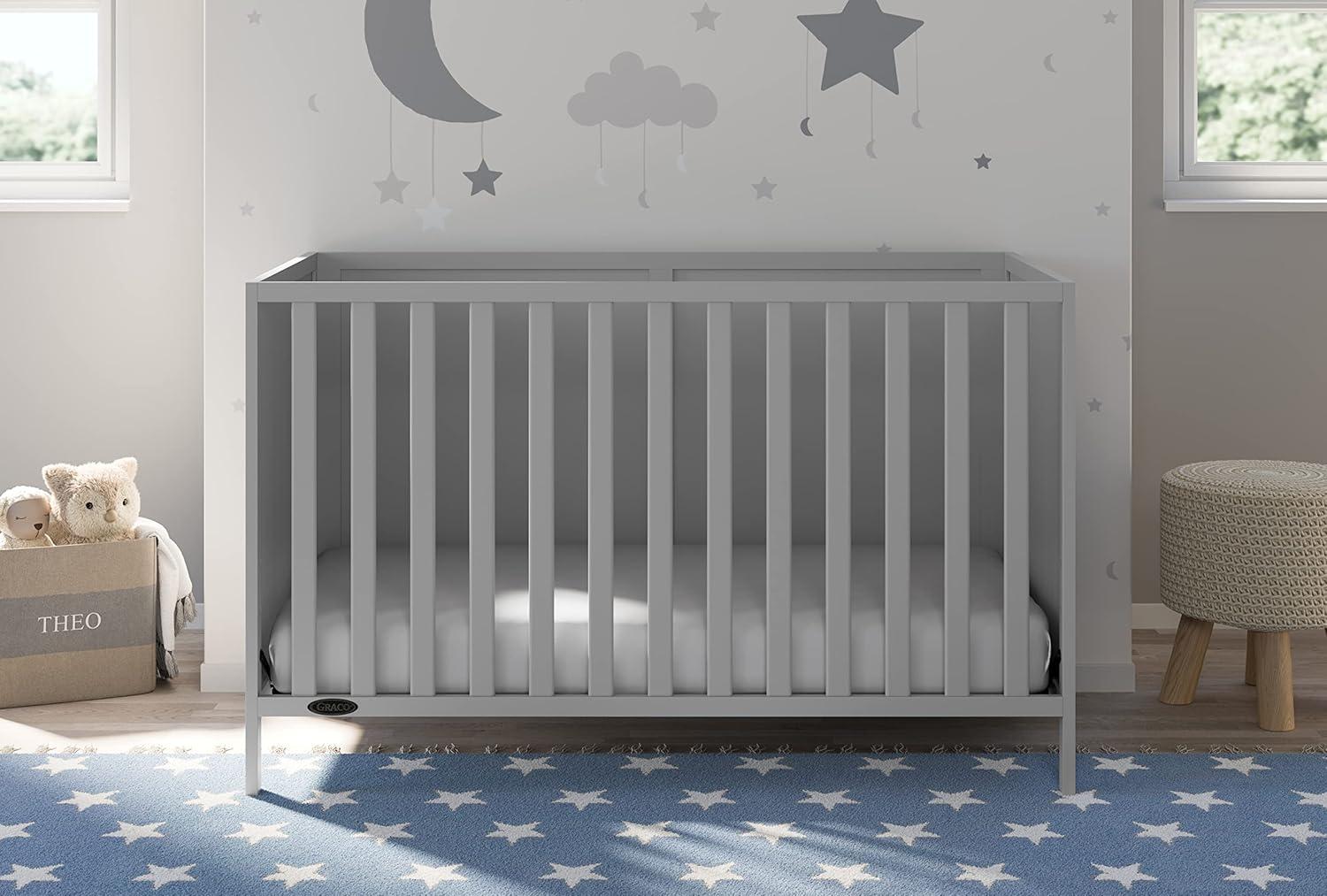 imageGraco Theo Convertible Crib with Storage Drawer Frosted Oat GREENGUARD Gold Certified Wooden Baby Crib with Drawer Converts to Toddler Bed Fits Standard Crib MattressPebble Gray