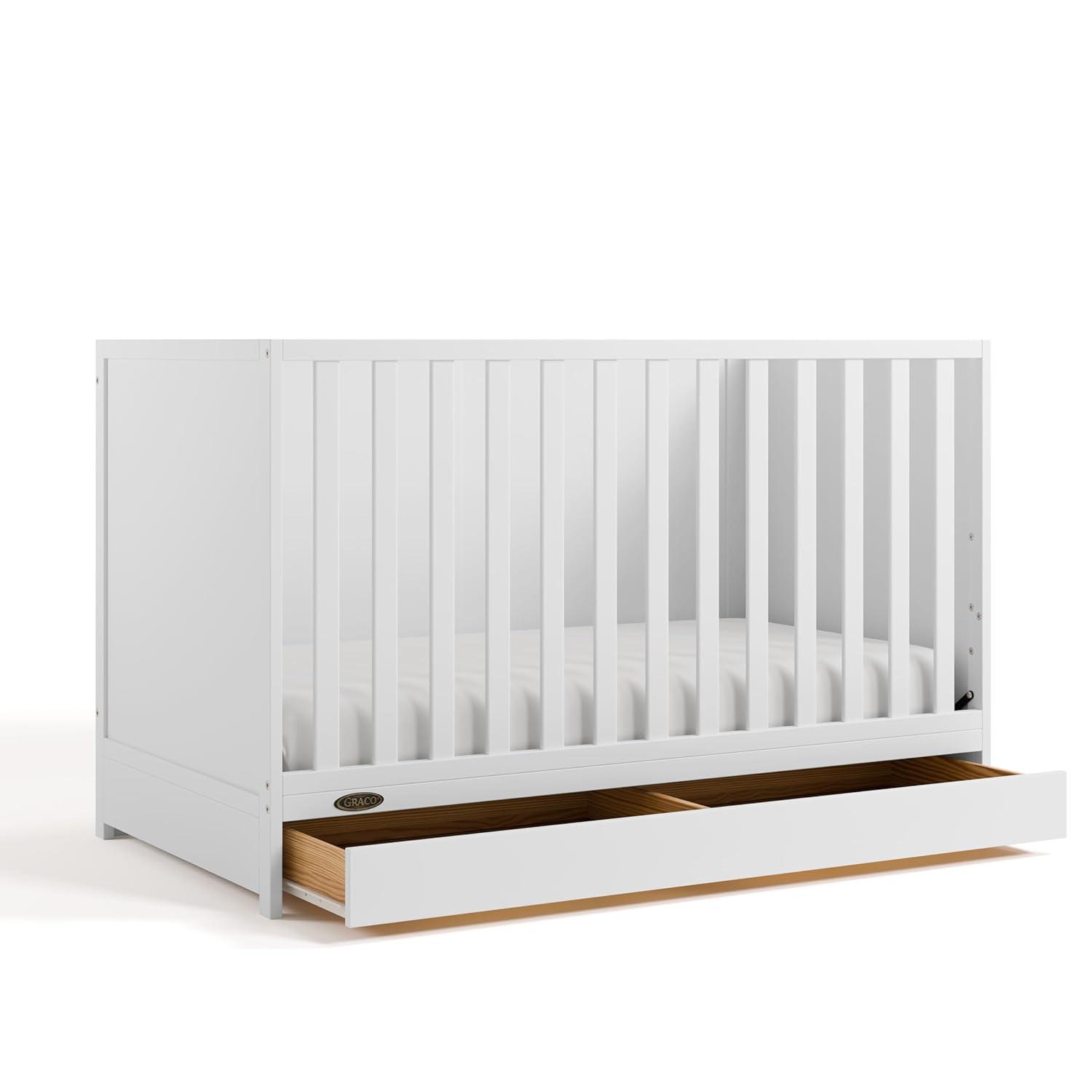 imageGraco Theo Convertible Crib with Storage Drawer Frosted Oat GREENGUARD Gold Certified Wooden Baby Crib with Drawer Converts to Toddler Bed Fits Standard Crib MattressWhite