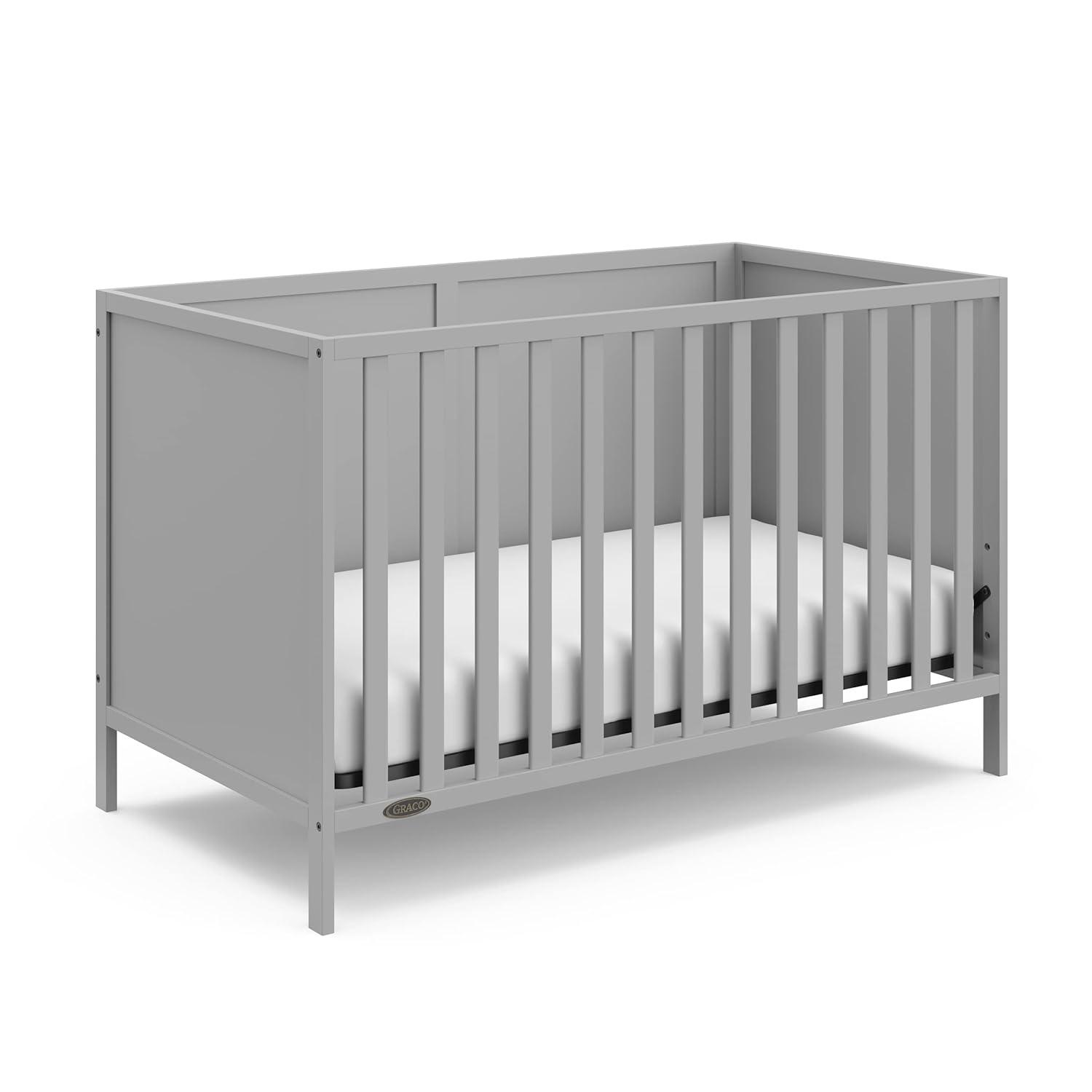 imageGraco Theo Convertible Crib with Storage Drawer Frosted Oat GREENGUARD Gold Certified Wooden Baby Crib with Drawer Converts to Toddler Bed Fits Standard Crib MattressPebble Gray