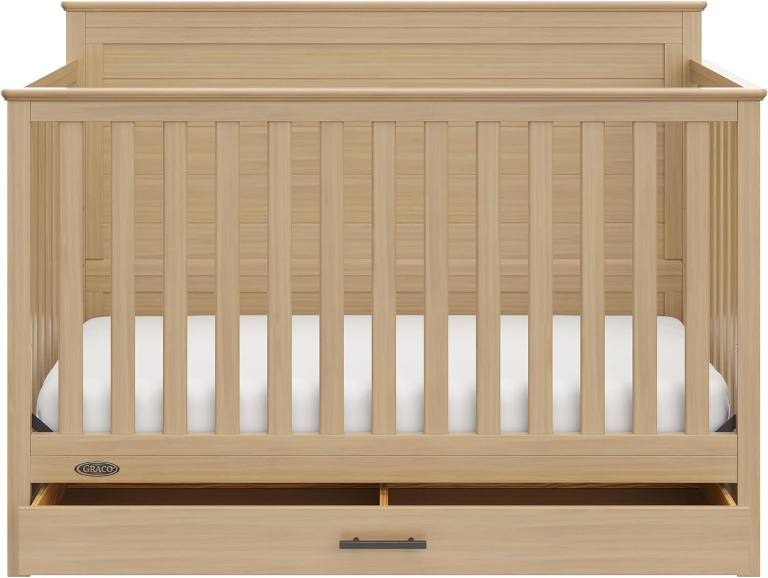 imageGraco Tristan 5in1 Convertible Crib with Drawer Frosted Oat GREENGUARD Gold Certified Fits Standard Crib Mattress Premium Handle Converts to Toddler Bed Daybed and FullSize BedDriftwood