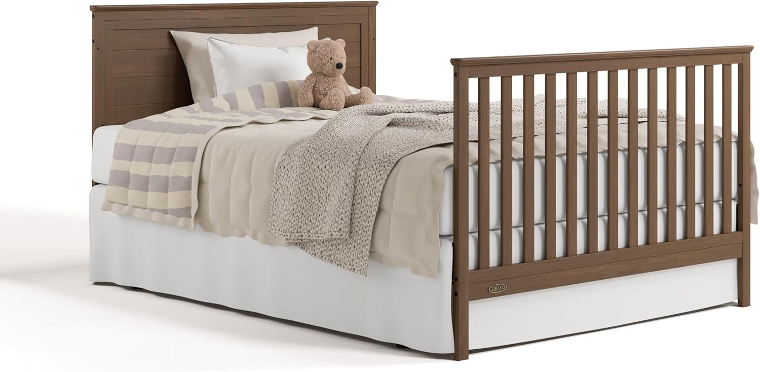 imageGraco Tristan 5in1 Convertible Crib with Drawer Frosted Oat GREENGUARD Gold Certified Fits Standard Crib Mattress Premium Handle Converts to Toddler Bed Daybed and FullSize BedHazelnut