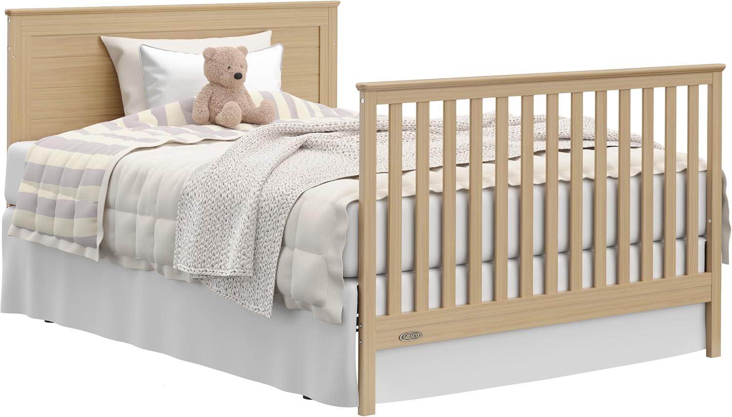 imageGraco Tristan 5in1 Convertible Crib with Drawer Frosted Oat GREENGUARD Gold Certified Fits Standard Crib Mattress Premium Handle Converts to Toddler Bed Daybed and FullSize BedDriftwood