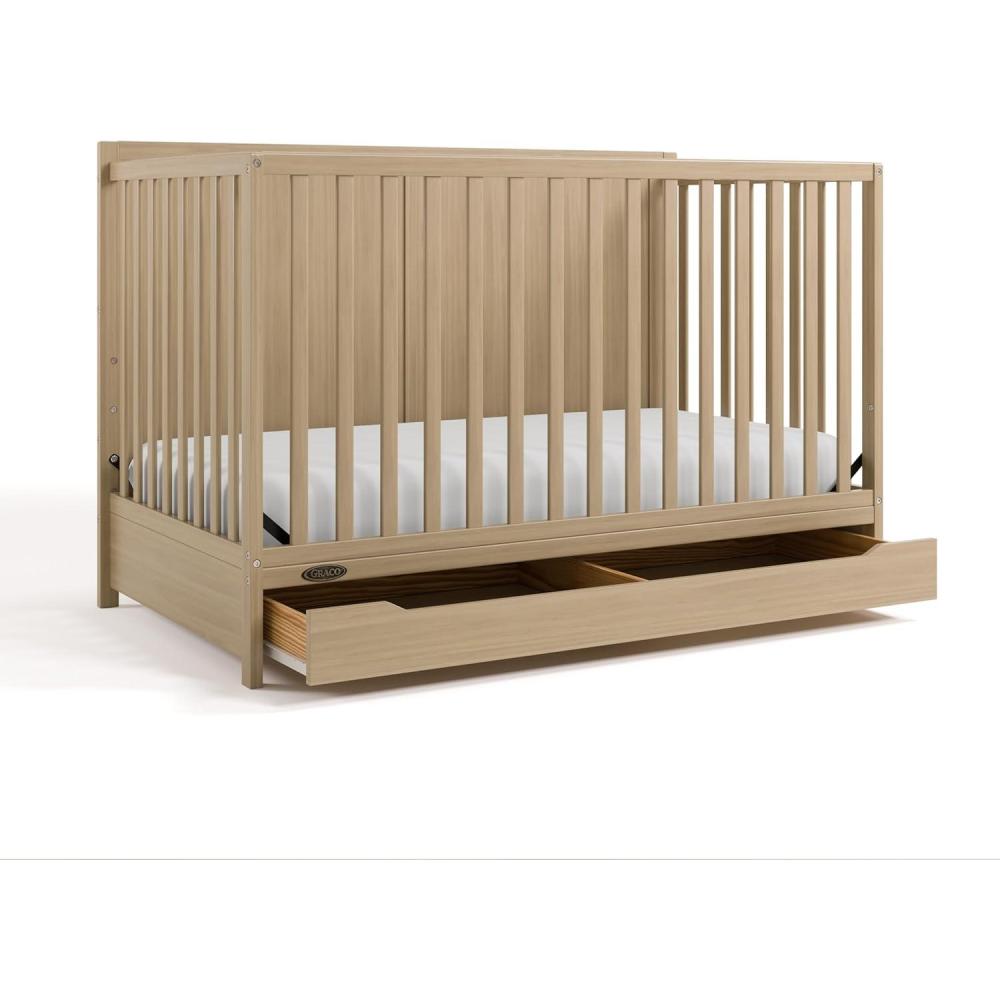 imageGraco Melrose 5in1 Convertible Crib with Drawer White GREENGUARD Gold Certified Fits Standard Crib Mattress Converts to Toddler Bed Daybed and Full Bed 4 Adjustable Mattress HeightsDriftwood