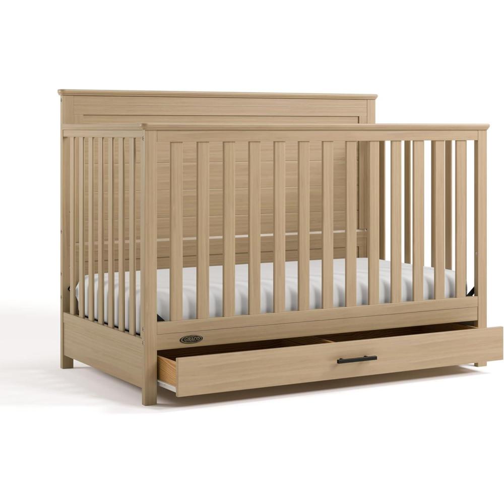 imageGraco Tristan 5in1 Convertible Crib with Drawer Frosted Oat GREENGUARD Gold Certified Fits Standard Crib Mattress Premium Handle Converts to Toddler Bed Daybed and FullSize BedDriftwood